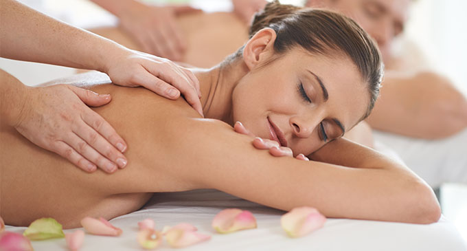 a woman enjoying a sleep easy massage on her back