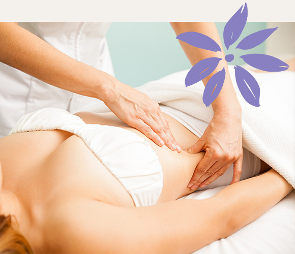 a woman receiving a lymphatic drainage massage